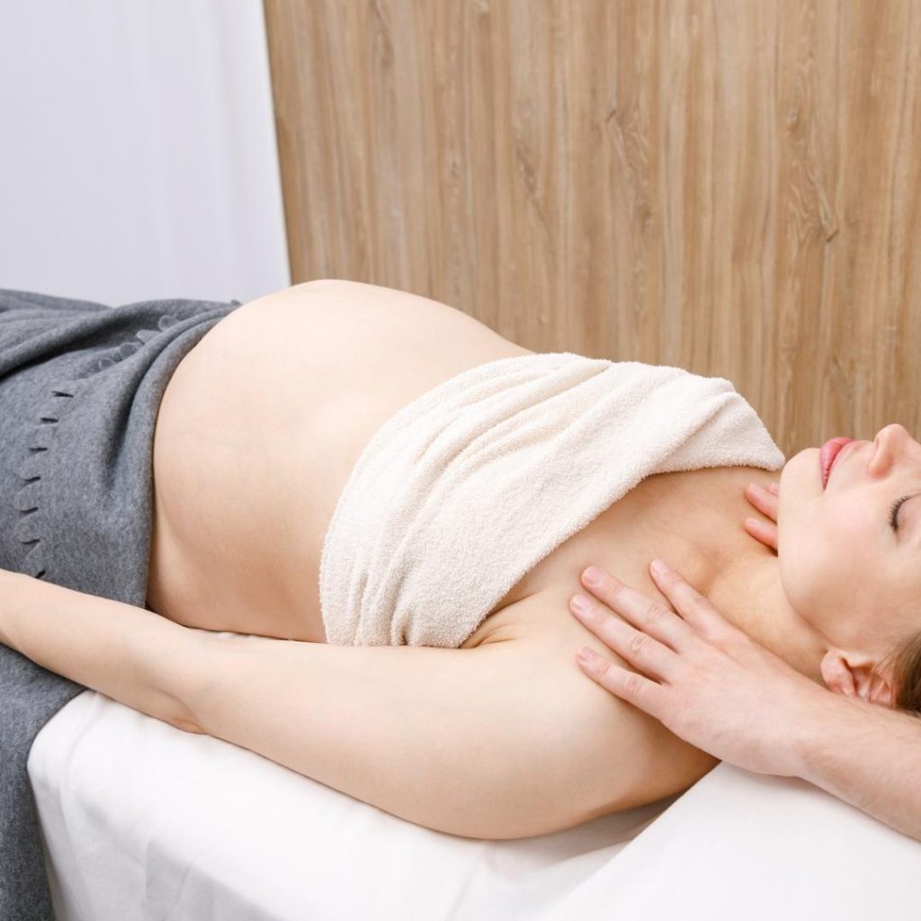 Image of woman getting a prenatal massage